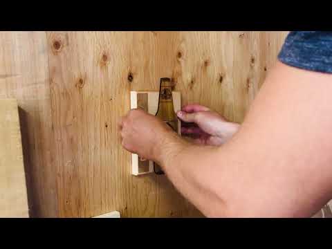 Vidéo de l'installation du décapsuleur mural à l'aide des keyholes dans un garage-BoisFrancK